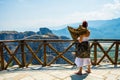 Woman is wearing a skirt and scarf in Meteora Monastery Royalty Free Stock Photo